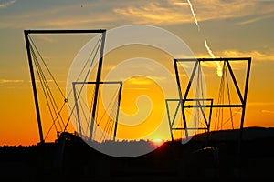 Construction Silhouette At Sunset photo